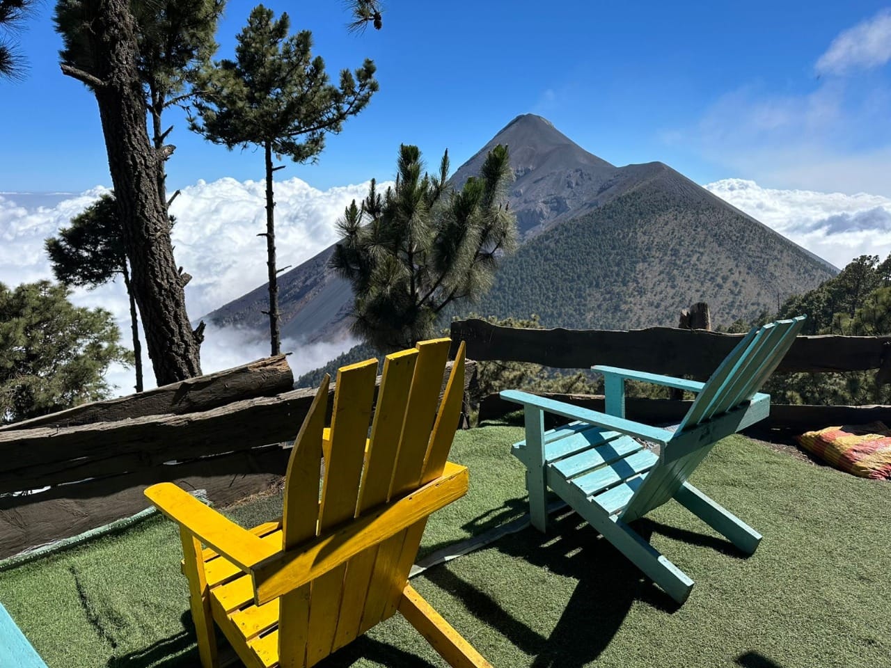 Volcán de Fuego seen from the base camp with Adirondack chairs